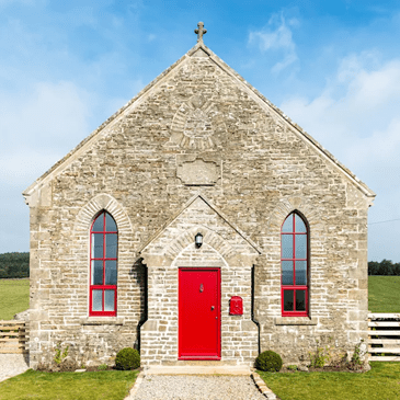Stone house with a red door